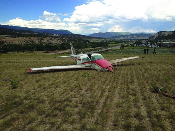PA24_ComancheInField_ CEN13LA362_NTSB